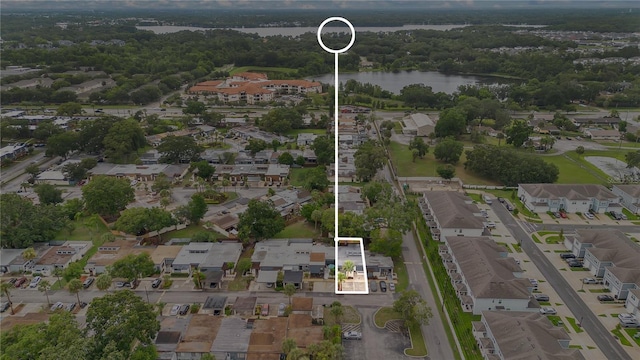 2541 Leeward Way, Winter Park, FL 32792 - aerial view of property's location featuring a large body of water, property parcel outlined, and nearby suburban area