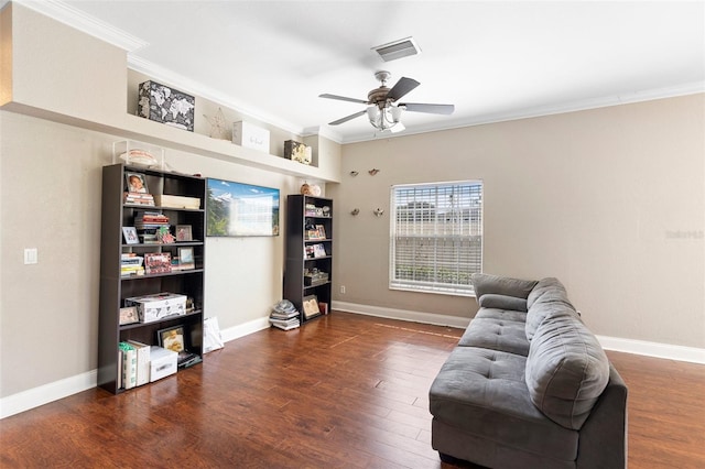 2017 W Gore St, Orlando, FL 32805 - sitting room featuring crown molding, a ceiling fan, wood finished floors, and baseboards