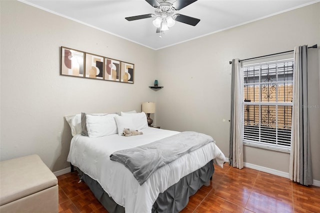 2017 W Gore St, Orlando, FL 32805 - bedroom with baseboards, ornamental molding, a ceiling fan, and wood finished floors