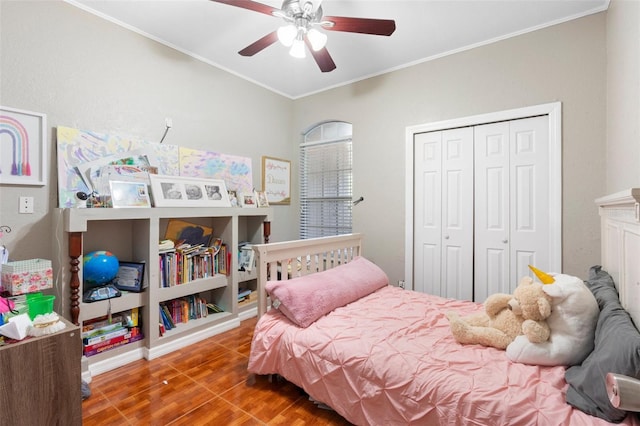 2017 W Gore St, Orlando, FL 32805 - bedroom featuring wood finished floors, crown molding, a closet, and ceiling fan