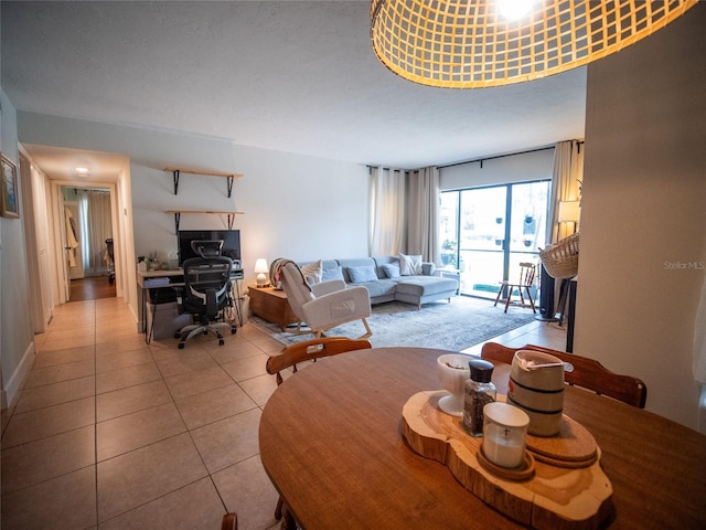 952 Courtyard Ln Unit 41, Orlando, FL 32825 - dining room featuring light tile patterned flooring and a desk