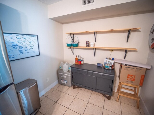 952 Courtyard Ln Unit 41, Orlando, FL 32825 - office area featuring light tile patterned flooring and baseboards