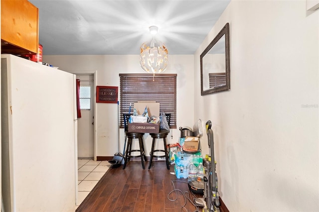 2044 W Gore St, Orlando, FL 32805 - dining area with a chandelier and baseboards
