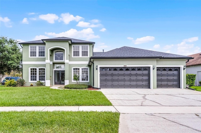 201 Hammock Dunes Pl, Orlando, FL 32828 - traditional-style house featuring a garage, driveway, a front yard, and stucco siding