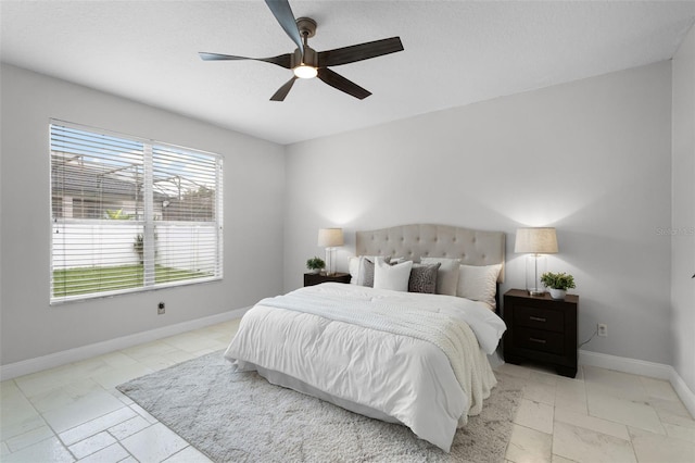 201 Hammock Dunes Pl, Orlando, FL 32828 - bedroom with baseboards and ceiling fan