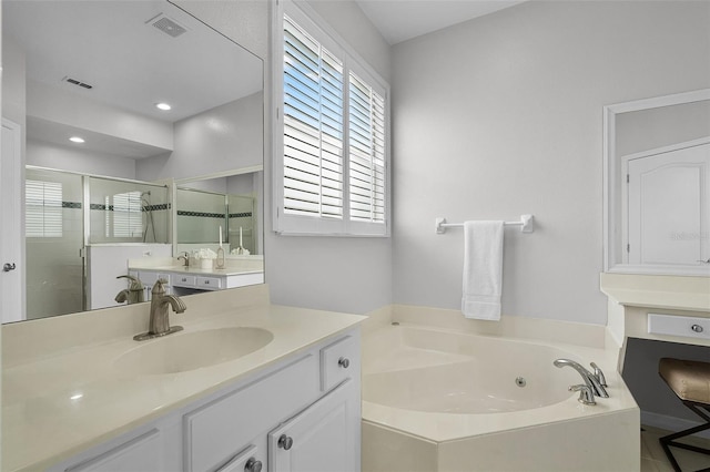 201 Hammock Dunes Pl, Orlando, FL 32828 - full bath featuring a shower stall, a whirlpool tub, and vanity