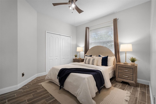 201 Hammock Dunes Pl, Orlando, FL 32828 - bedroom with baseboards, wood finish floors, a closet, and a ceiling fan