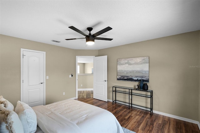 201 Hammock Dunes Pl, Orlando, FL 32828 - bedroom with baseboards, wood finished floors, and ceiling fan