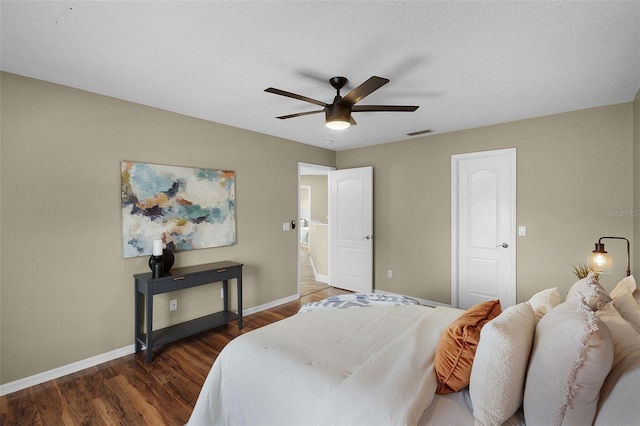 201 Hammock Dunes Pl, Orlando, FL 32828 - bedroom featuring baseboards, wood finished floors, and a ceiling fan