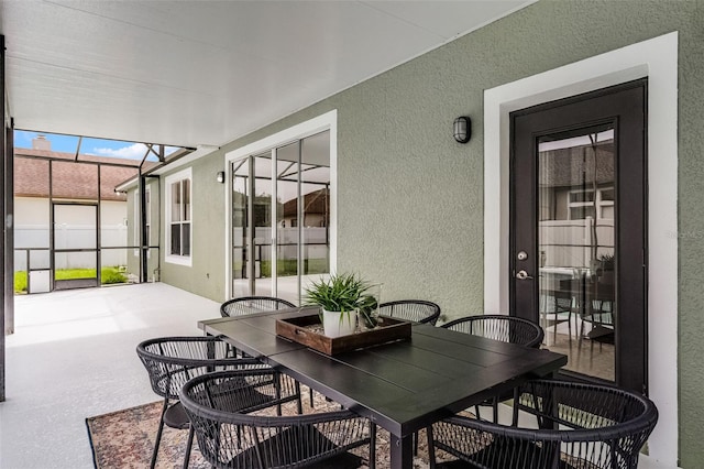 201 Hammock Dunes Pl, Orlando, FL 32828 - sunroom featuring outdoor dining area