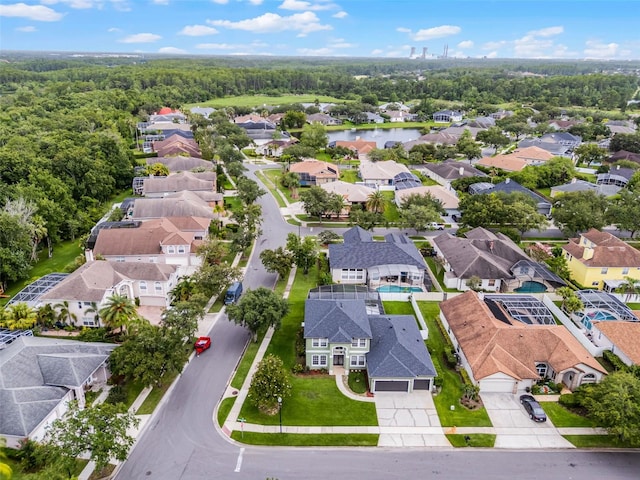 201 Hammock Dunes Pl, Orlando, FL 32828 - aerial view of residential area with a large body of water and a heavily wooded area
