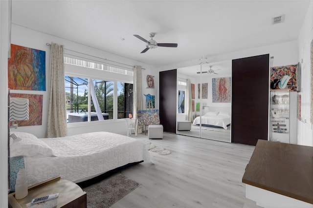 16120 Bristol Lake Cir, Orlando, FL 32828 - bedroom featuring light wood-type flooring and ceiling fan