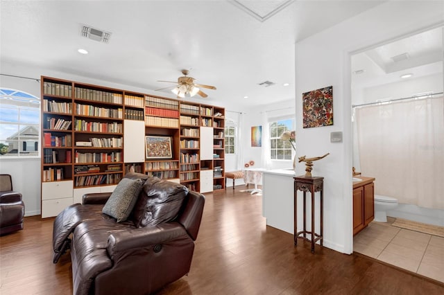 16120 Bristol Lake Cir, Orlando, FL 32828 - living room featuring ceiling fan, dark wood finished floors, and recessed lighting