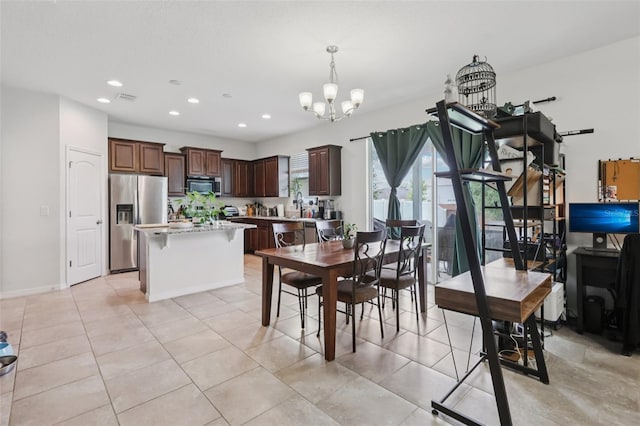 16440 Centipede St, Clermont, FL 34714 - dining space featuring recessed lighting, a chandelier, and light tile patterned floors