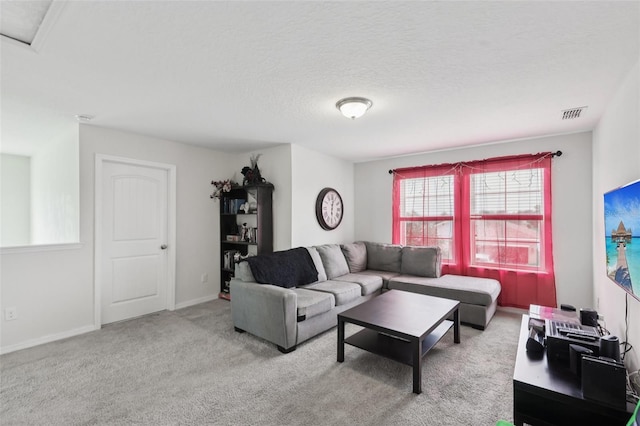 16440 Centipede St, Clermont, FL 34714 - carpeted living area featuring a textured ceiling