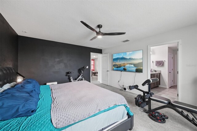 16440 Centipede St, Clermont, FL 34714 - bedroom with carpet, ceiling fan, and a textured ceiling