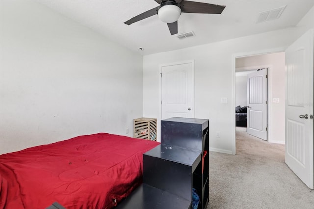 16440 Centipede St, Clermont, FL 34714 - carpeted bedroom with baseboards and ceiling fan