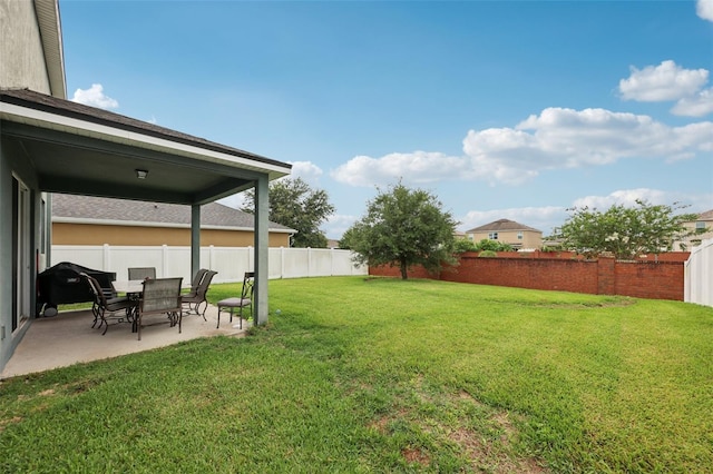 16440 Centipede St, Clermont, FL 34714 - fenced backyard with a patio