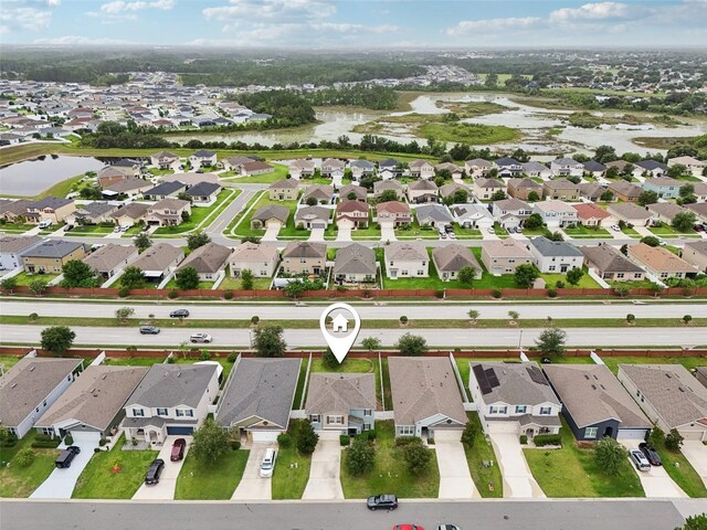 16440 Centipede St, Clermont, FL 34714 - view of property location with a large body of water and nearby suburban area