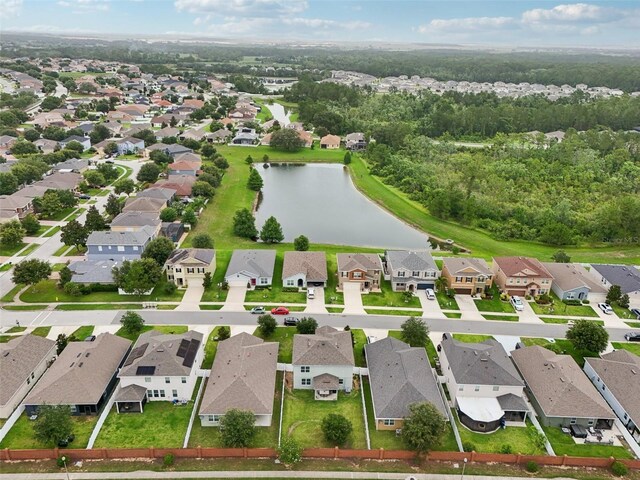16440 Centipede St, Clermont, FL 34714 - aerial perspective of suburban area with a nearby body of water