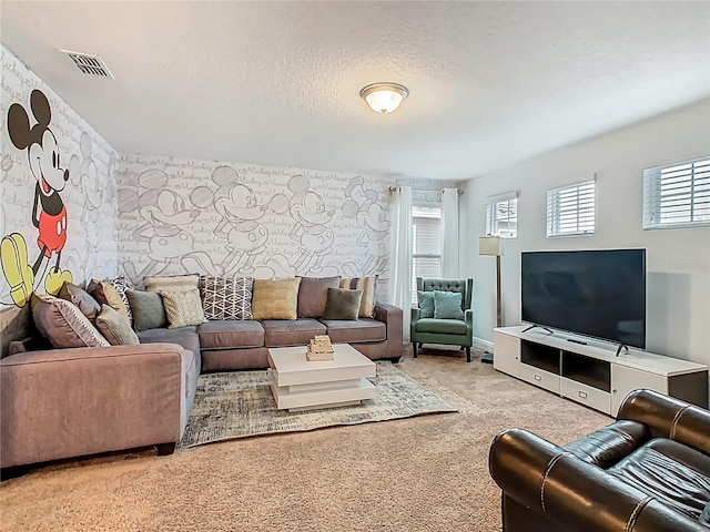 5255 Wildwood Way, Davenport, FL 33837 - carpeted living room with a textured ceiling