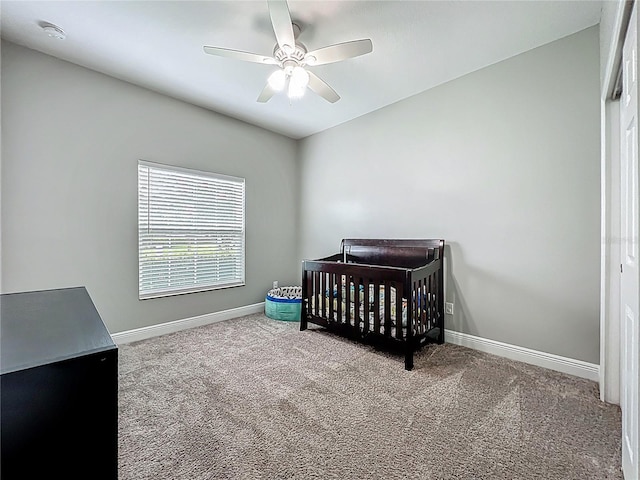 1540 Orange Valley Rdg, Ocoee, FL 34761 - carpeted bedroom featuring baseboards, a nursery area, and ceiling fan