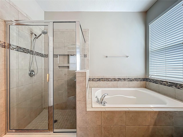 1540 Orange Valley Rdg, Ocoee, FL 34761 - full bathroom with a garden tub, a stall shower, and plenty of natural light