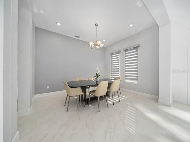 8085 Ludington Cir, Orlando, FL 32836 - dining area with a chandelier, marble finish flooring, and recessed lighting