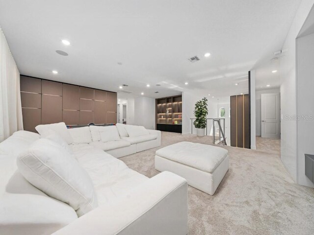 8085 Ludington Cir, Orlando, FL 32836 - living area with recessed lighting and light colored carpet