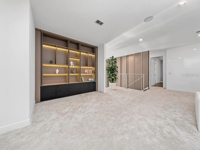 8085 Ludington Cir, Orlando, FL 32836 - unfurnished living room featuring carpet floors and recessed lighting