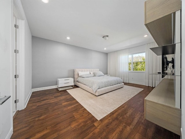 8085 Ludington Cir, Orlando, FL 32836 - bedroom featuring dark wood-style floors and recessed lighting