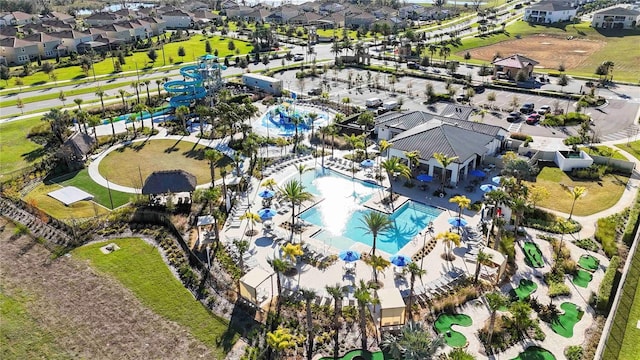 8975 Fluffy Lie Ct, Davenport, FL 33896 - aerial perspective of suburban area featuring a pool area