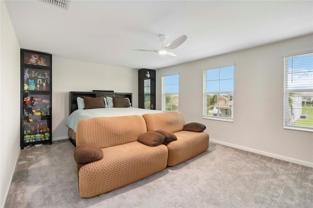 8975 Fluffy Lie Ct, Davenport, FL 33896 - bedroom featuring carpet floors and a ceiling fan