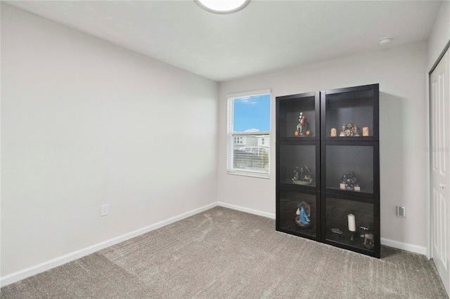 8975 Fluffy Lie Ct, Davenport, FL 33896 - empty room with carpet flooring and a smoke detector