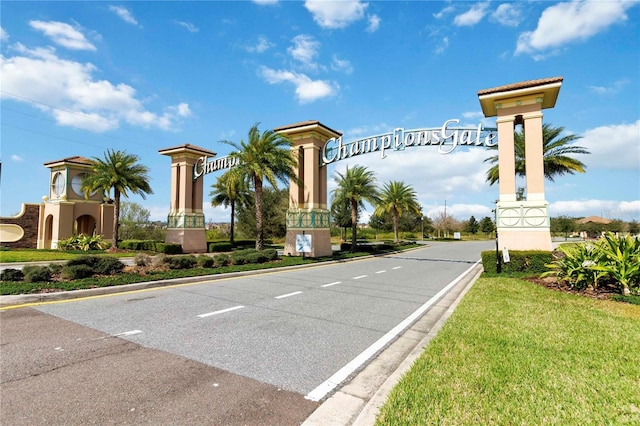 8975 Fluffy Lie Ct, Davenport, FL 33896 - view of asphalt road with curbs