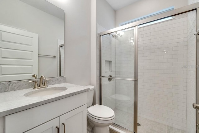 11063 Hollow Bay Dr, Winter Garden, FL 34787 - full bath featuring toilet, a stall shower, and vanity