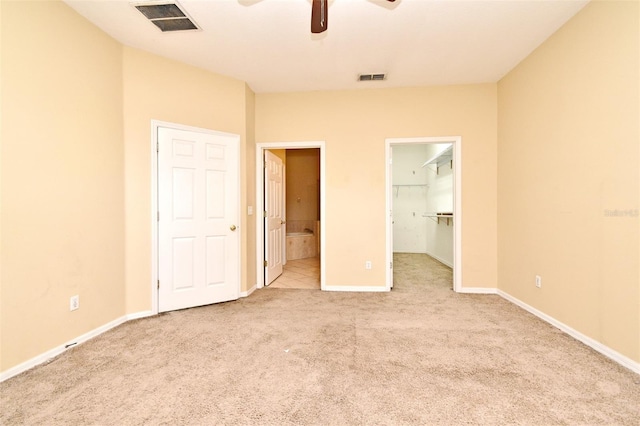 1086 Wickerwood St, Ocoee, FL 34761 - unfurnished bedroom featuring carpet floors, a spacious closet, baseboards, ensuite bath, and a closet