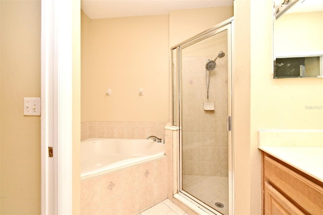 1086 Wickerwood St, Ocoee, FL 34761 - bathroom featuring a garden tub, a stall shower, tile patterned floors, and vanity