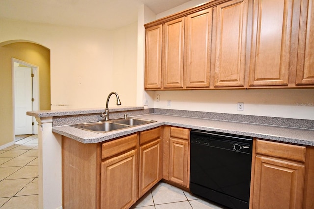 1086 Wickerwood St, Ocoee, FL 34761 - kitchen featuring black dishwasher, a sink, light tile patterned floors, and a peninsula