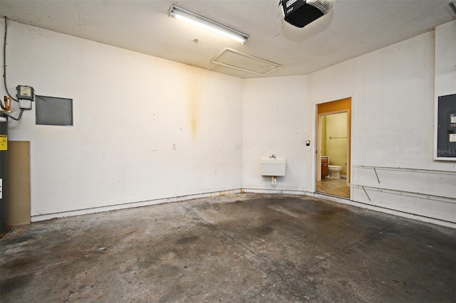 1086 Wickerwood St, Ocoee, FL 34761 - garage with a garage door opener, a sink, and electric panel
