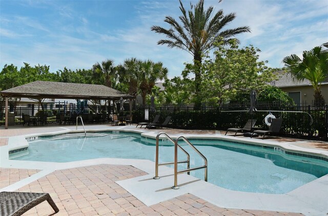 1086 Wickerwood St, Ocoee, FL 34761 - community pool with a gazebo and a patio