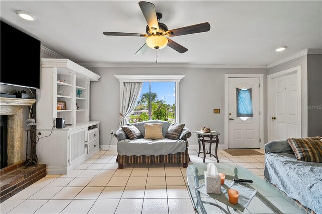 2112 Plymouth Sorrento Rd, Apopka, FL 32712 - living area with ceiling fan, crown molding, a fireplace, light tile patterned floors, and baseboards