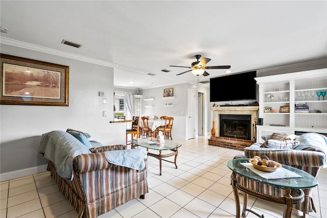 2112 Plymouth Sorrento Rd, Apopka, FL 32712 - living room featuring light tile patterned floors, ceiling fan, ornamental molding, a brick fireplace, and baseboards