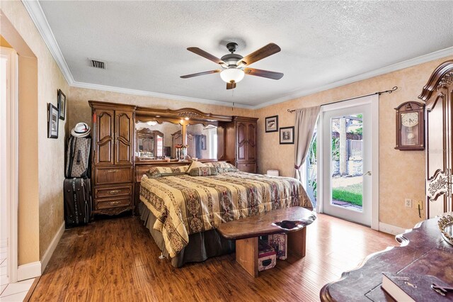 2112 Plymouth Sorrento Rd, Apopka, FL 32712 - bedroom featuring dark wood-style floors, access to outside, ornamental molding, baseboards, and a textured ceiling