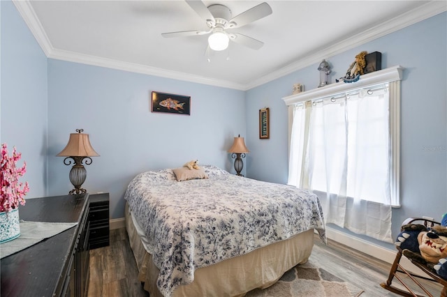 2112 Plymouth Sorrento Rd, Apopka, FL 32712 - bedroom featuring dark wood-style floors, ornamental molding, baseboards, and ceiling fan