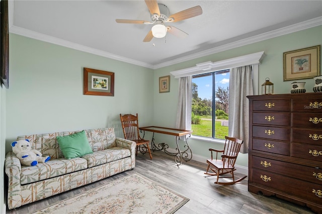 2112 Plymouth Sorrento Rd, Apopka, FL 32712 - living room with crown molding, wood finished floors, a ceiling fan, and baseboards