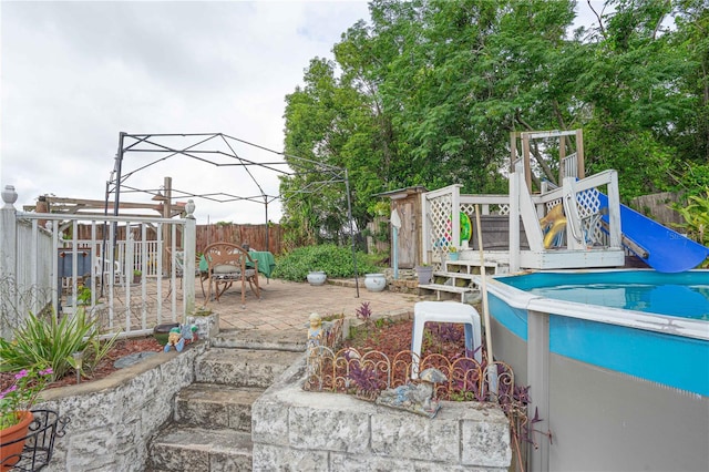 2112 Plymouth Sorrento Rd, Apopka, FL 32712 - fenced backyard featuring a wooden deck and a patio