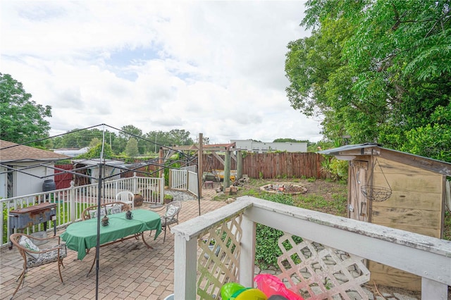 2112 Plymouth Sorrento Rd, Apopka, FL 32712 - fenced backyard with a patio and a fire pit
