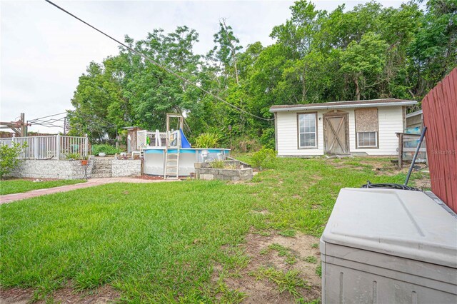 2112 Plymouth Sorrento Rd, Apopka, FL 32712 - view of yard featuring an outdoor pool, an outdoor structure, and a jacuzzi