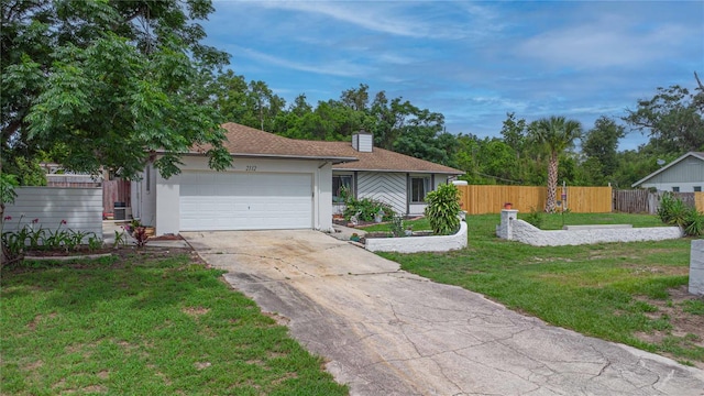 2112 Plymouth Sorrento Rd, Apopka, FL 32712 - view of front of home with driveway, an attached garage, and a chimney